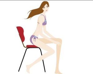 Bikini Girl Sitting On A Chair