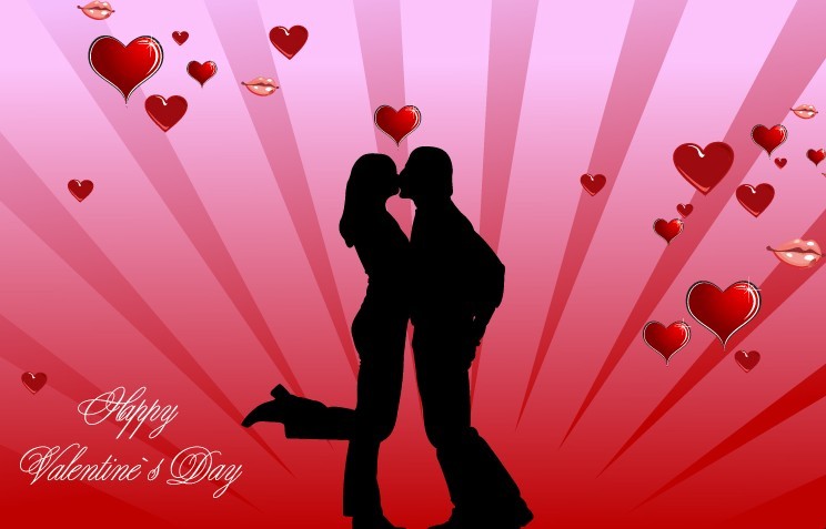 Vector Silhouetted Couple Kissing With Heart Background