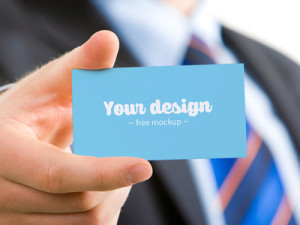 Business Card In Hand PSD Mockup