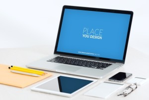 Macbook with Office Items PSD Mockup