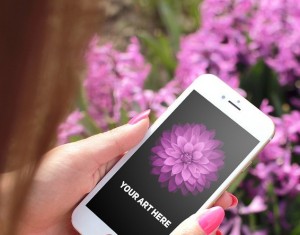 iPhone 6 In Woman's Hands Mockup PSD