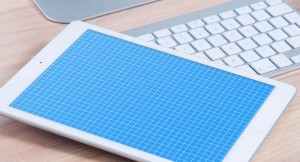 Photo Realistic iPad On Desk Mockup PSD