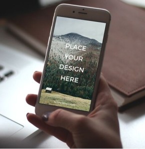 Photographic iPhone 6 In Hand Mockup PSD